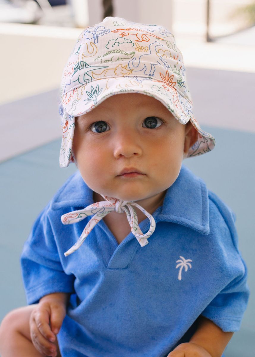 Acorn Kids Dino Soft Jersey Flap Cap in Natural and Multi