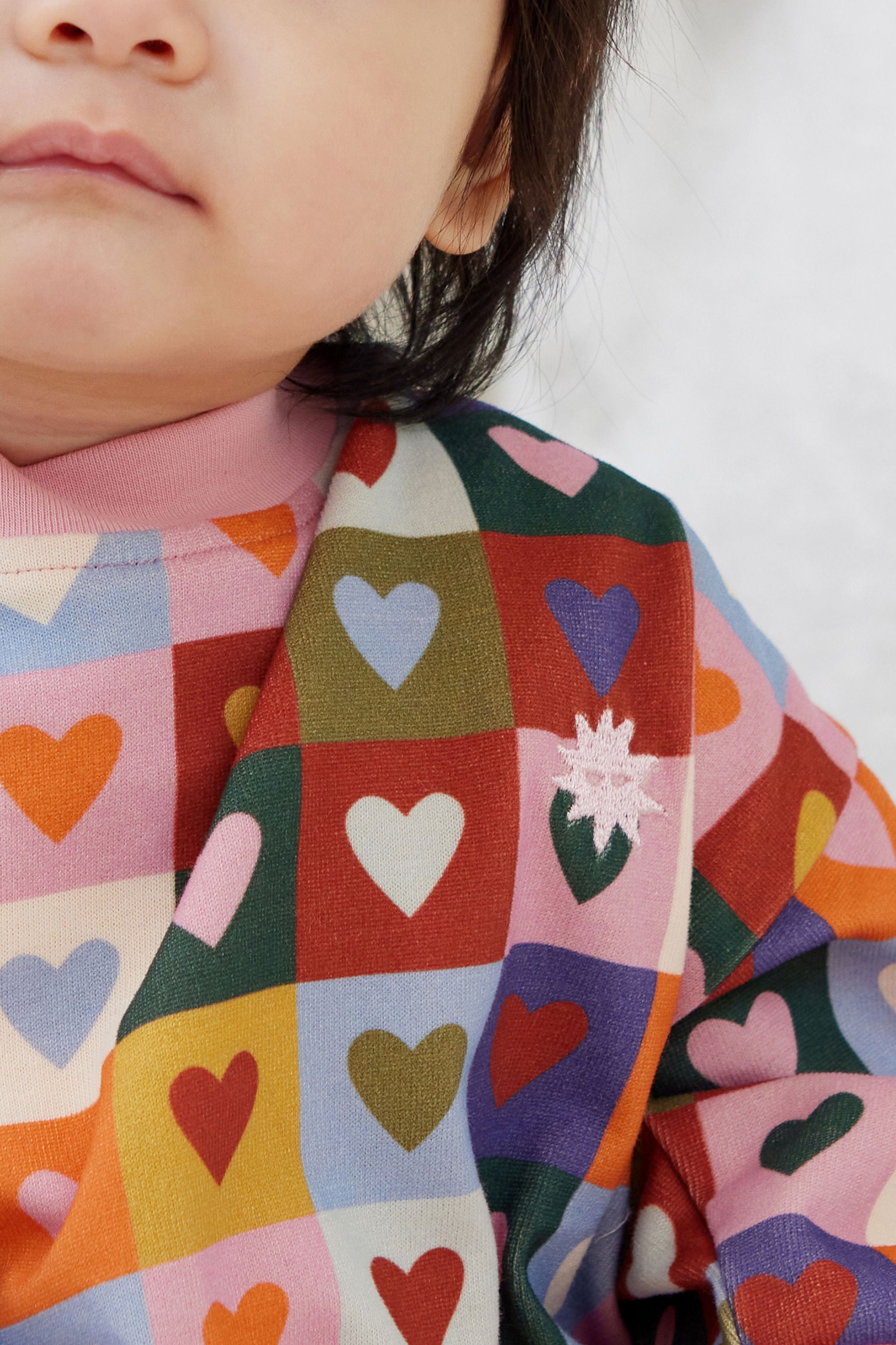 Kapow Heart Checkerboard Sweater
